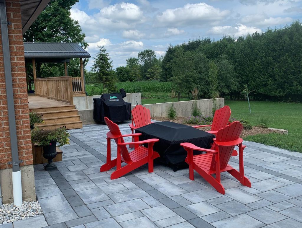 Stone patio with outdoor fireplace